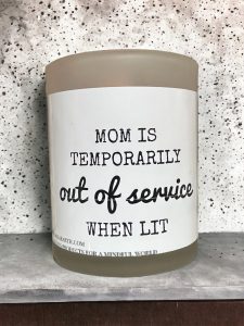 Candle labelled Mom Is Temporarily Out of Service When Lit