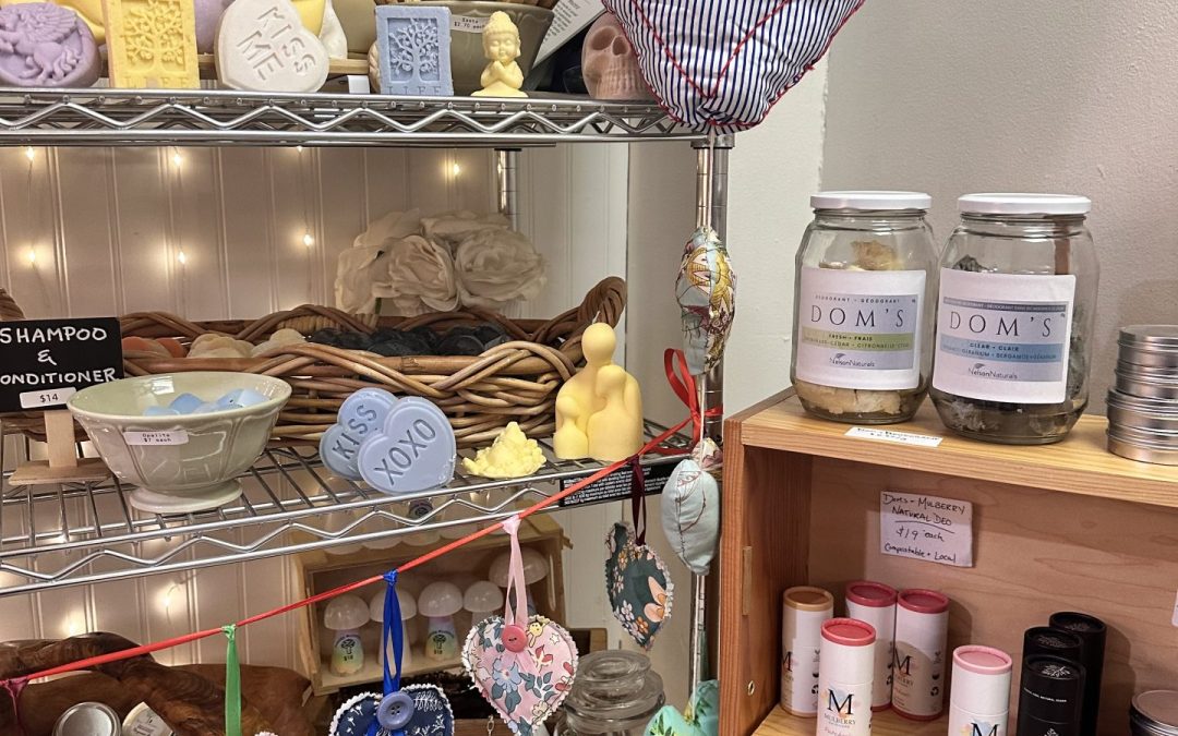 Shop shelves displaying heart soaps, magnesium products and sachets