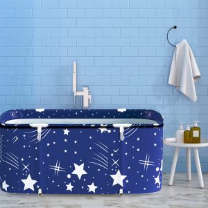 Portable folding bathtub with a star pattern in a blue-tiled bathroom